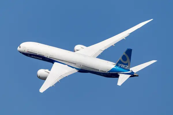 Boeing 787 Dreamliner aircraft in flight, viewed from a slight side angle