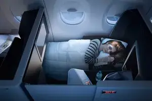 Bed on board Delta Airlines, in the Delta One suite class cabin