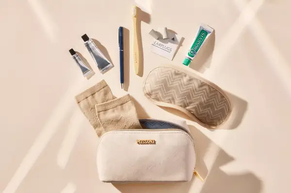 Contents of a Missoni amenity kit including an eye mask and personal care items