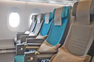 Economy class seating in an airplane cabin