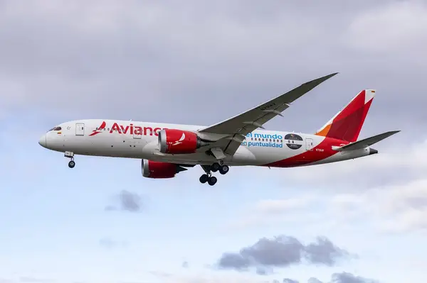 An Avianca airplane in flight side view