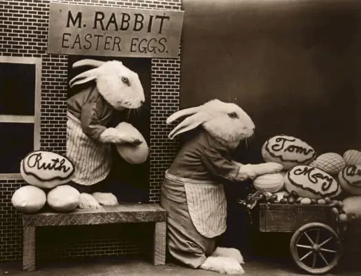 archival image easter bunnies loading eggs on cart