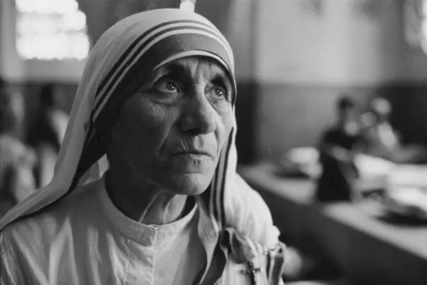 closeup of mother teresa in her nun habit looking skyward