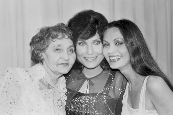 original caption buena park, california country family heres a kind of royal family of country music loretta lynn center poses with her mother, clara butcher, and sister, crystal gayle, at the 15th annual academy of country music awards ceremonies at knotts berry farm may 1 loretta and crystal both won awards