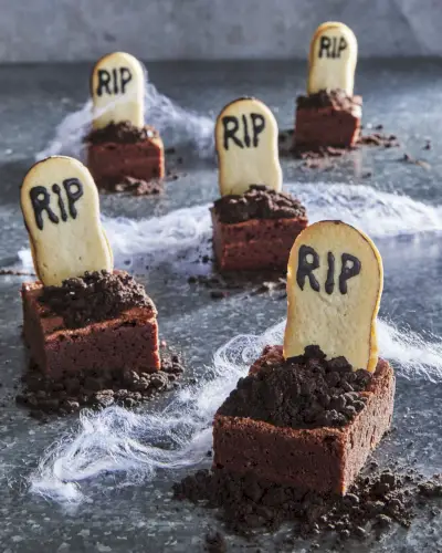 woman in halloween elf costume taking selfie in the forest