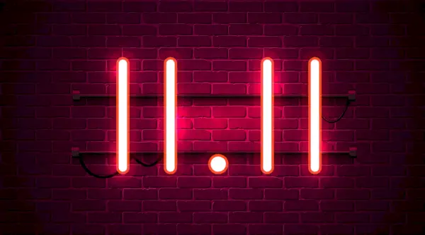 digits 11 point 11 in pink neon against a brick wall