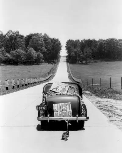 back view of vintage car with just married sign, black and white, that you might post in instagram with wedding vibes caption