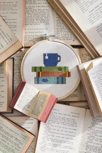 books and teacup cross stitch pattern
