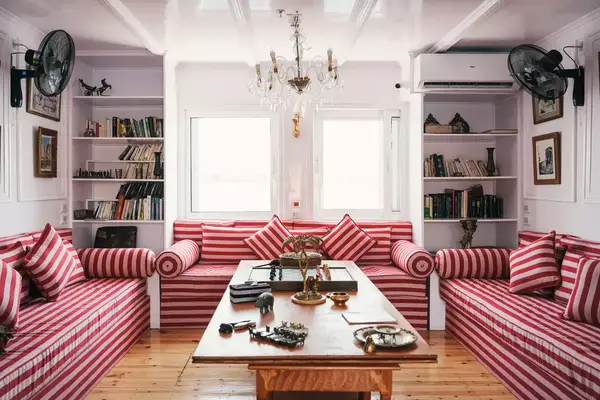 A red and white striped sofa on a Nile River ship
