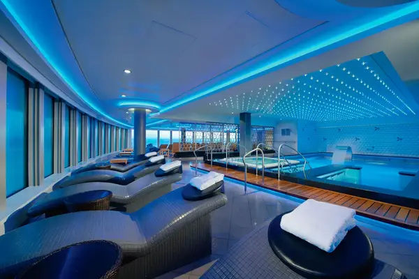 Loungers and pool at the Mandara Spa on the Norwegian Getaway cruise ship