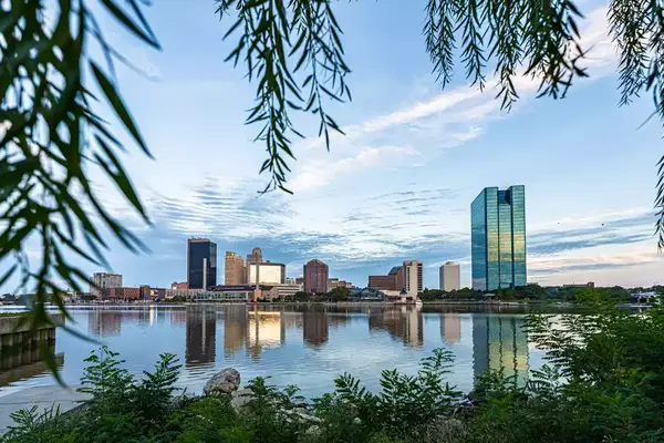 Looking through tree branches to the skyline of Toledo, Ohio