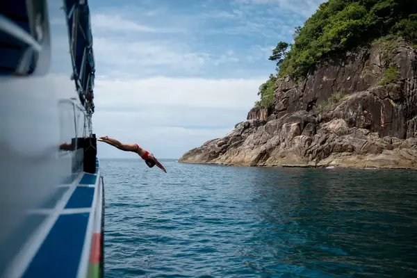 Diving off a boat in Thailand.