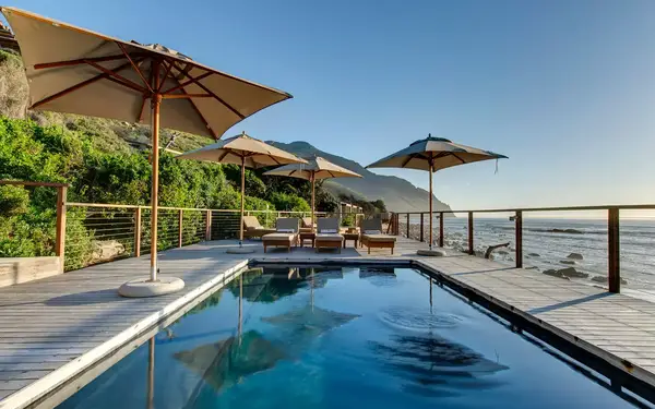 Pool and lounge chairs at Tintswalo Atlantic, Cape Town, South Africa