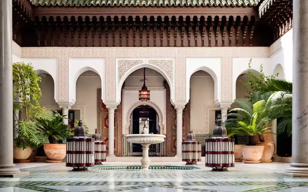 Lavish courtyard with fountain at La Mamounia, Morocco.