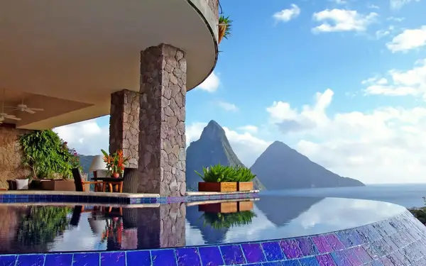 Pool at Jade Mountain Resort, St. Lucia with a view of mountains in the distance.