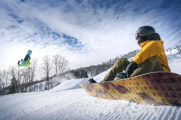 Two snowboarders at Highlands at harbor springs