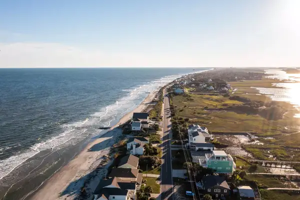 Aerial view of houses along the coast of Folly Beach