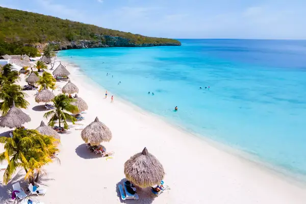Cas Abao Beach Playa Cas Abao Curacao Caribbean island of Curacao, Playa Cas Abao with beach chairs and umbrellas in Curacao and a turqouse colored ocean