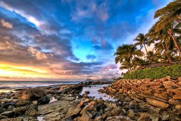 Secret Beach at Kapolei, Oahu, Hawaii at sunset.