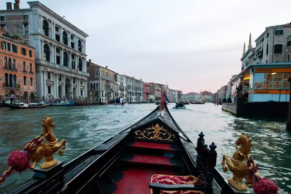 View from a gondola of Venice buildings