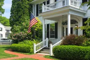 Home with American Flag, Captain Jefferds Inn, Kennebunkport, Maine, USA