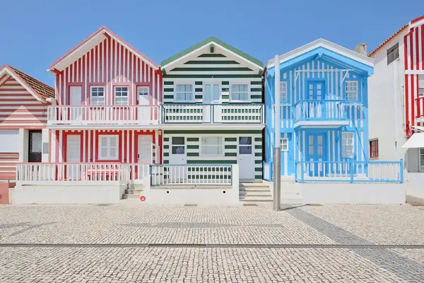 Three colorful striped houses in Aveiro Portugal