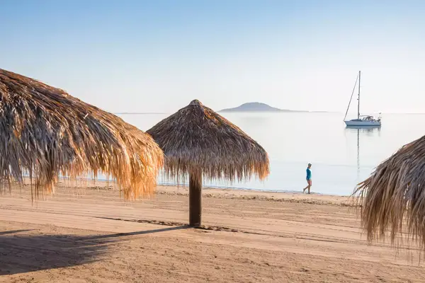 Woman walking on a beach