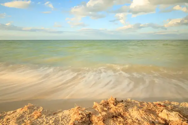 Waves hitting the shore