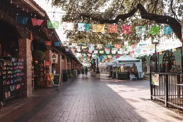 Colorful flags over a walkway