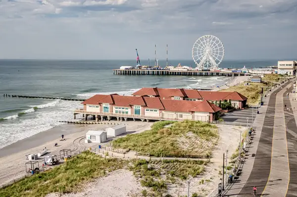 View of Atlantic City beach, pier with ferris wheel in background