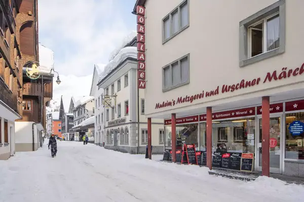 A snowy street scene in Andermatt, Switzerland