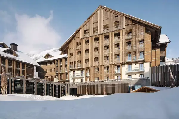 Exterior of the Chedi Andermatt hotel in winter