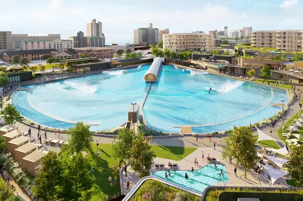 Rendering of an artificial wave pool complex surrounded by urban buildings and leisure areas