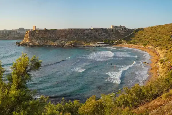 Panoramic view of Ghajn Tuffieha Bay (Mellieha) at sunset light, Malta