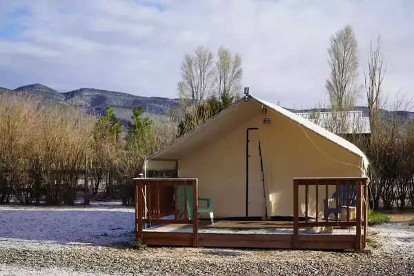 Exterior of a glamping tent at Wildland Gardens