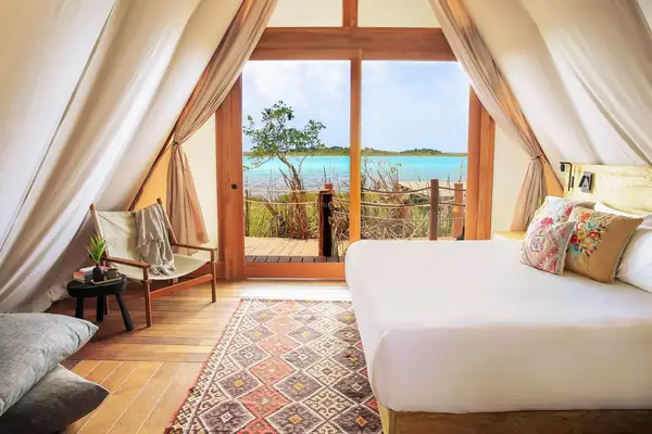 A guest room at Habitas Bacalar, with views of Lake Bacalar