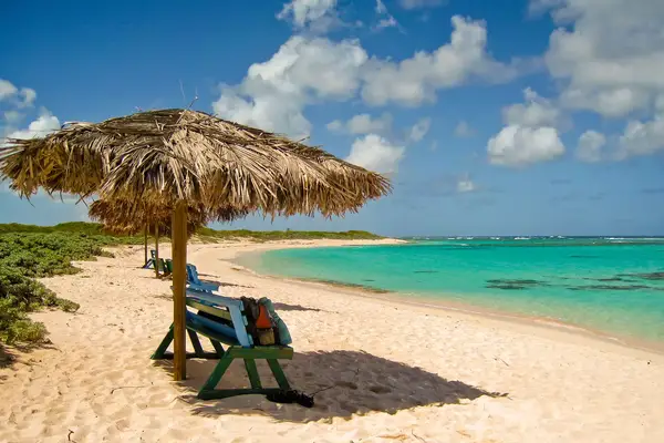 Anegada is an island in the British Virgin Island and its name in English means Flat. The waters are emerald green and its beauty is almost unbelievable.