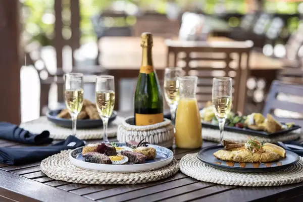 Food on a table with champagne