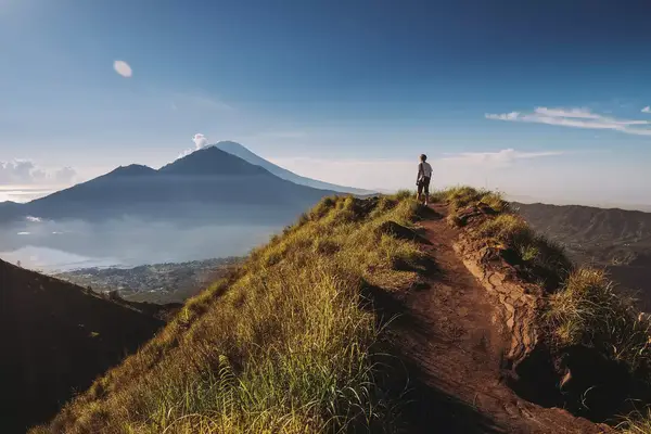Hiker staying on top of Mount Batur