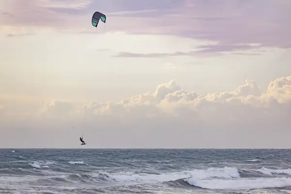 A kite surfer in the ocean