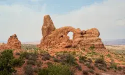Rock formation in Arches National Park featuring a natural arch