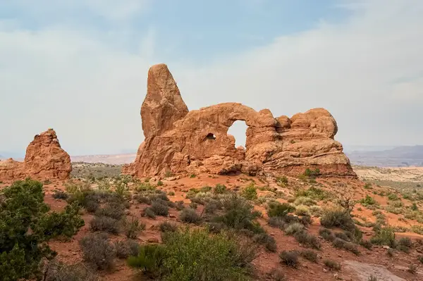 Rock formation in Arches National Park featuring a natural arch