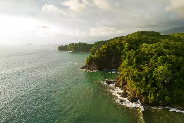 An aerial view of the pacific ocean and coastline in Costa Rica