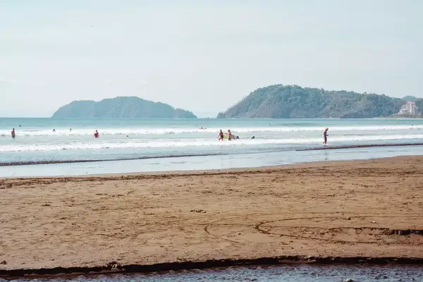 Surfers at Jaco Beach