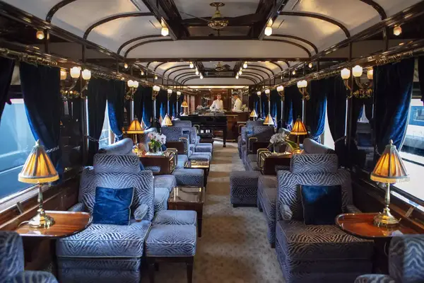 The art deco bar lounge wagon of the train Belmond Venice Simplon Orient Express luxury train. 