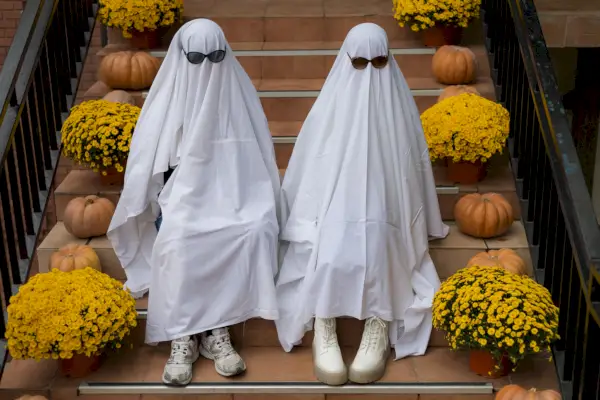 trendy entertainment is to dress in white bedspreads or sheets symbolically depicting ghosts ghost challenge