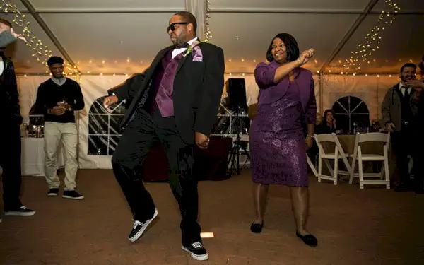 mother and son at a wedding dancing