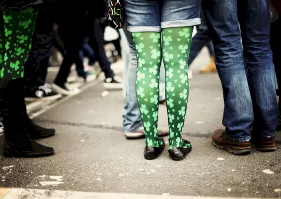 st patricks day parade photo focusing on woman