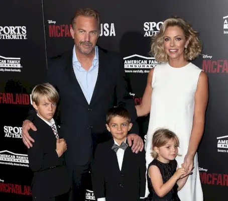 hollywood, ca february 09 actor kevin costner, wife christine baumgartner and children attend the premiere of disneys mcfarland, usa at the el capitan theatre on february 9, 2015 in hollywood, california photo by david livingstongetty images