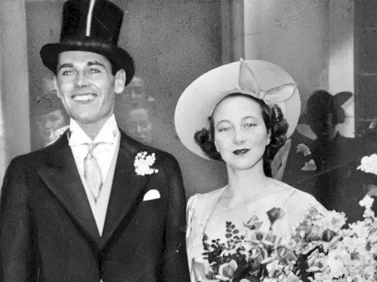 Photograph, Facial expression, Vintage clothing, Headgear, Smile, Formal wear, Suit, Retro style, Event, Dress, 